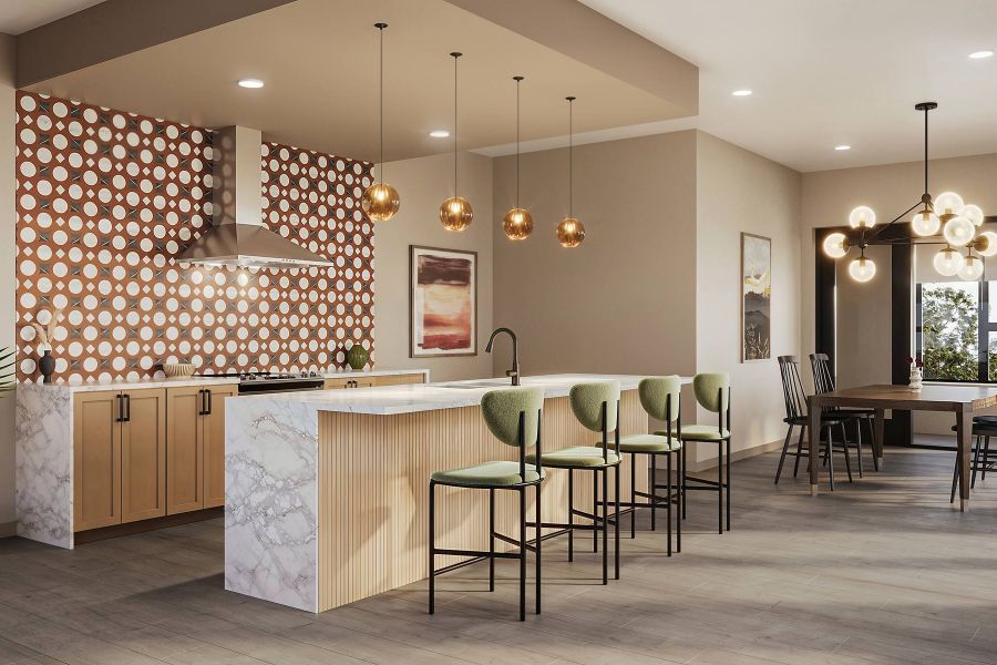 Modern kitchen with marble island, green barstools, gold pendant lights, and patterned tile backsplash at Harlow.